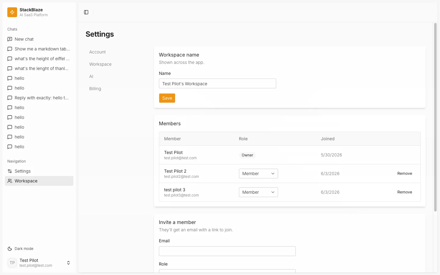 Workspace settings with a members table, role selectors and an invite-by-email form